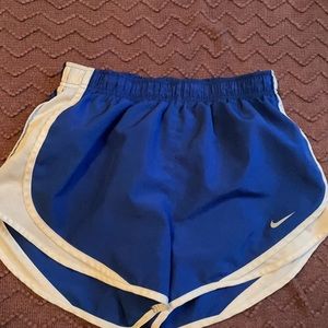 Blue and White Nike running shorts